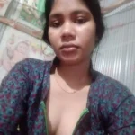 showing her cleavage in an open dress